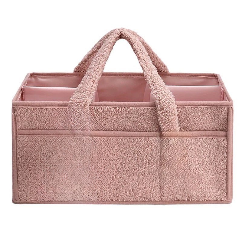 Boucle nappy caddy in soft textured fabric for nursery organization with spacious compartments