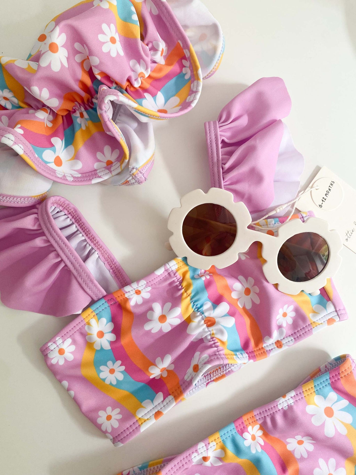 Kids wearing Flower Sunnies with UV 400 protection and flower-shaped frames