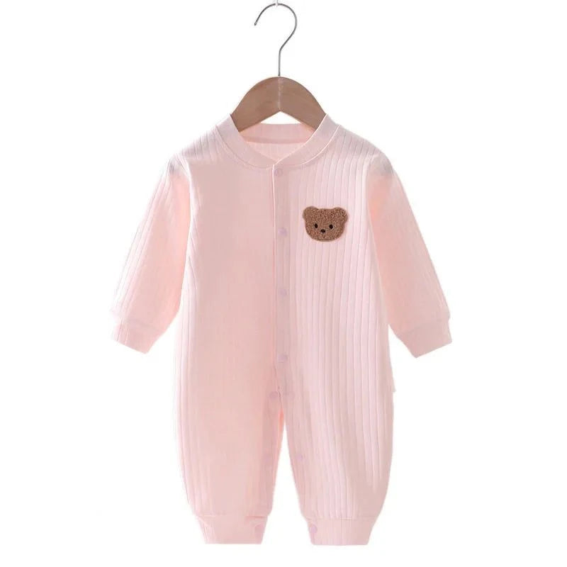 Baby wearing The Little Bear Cotton Romper made of soft natural fabric for comfort and warmth