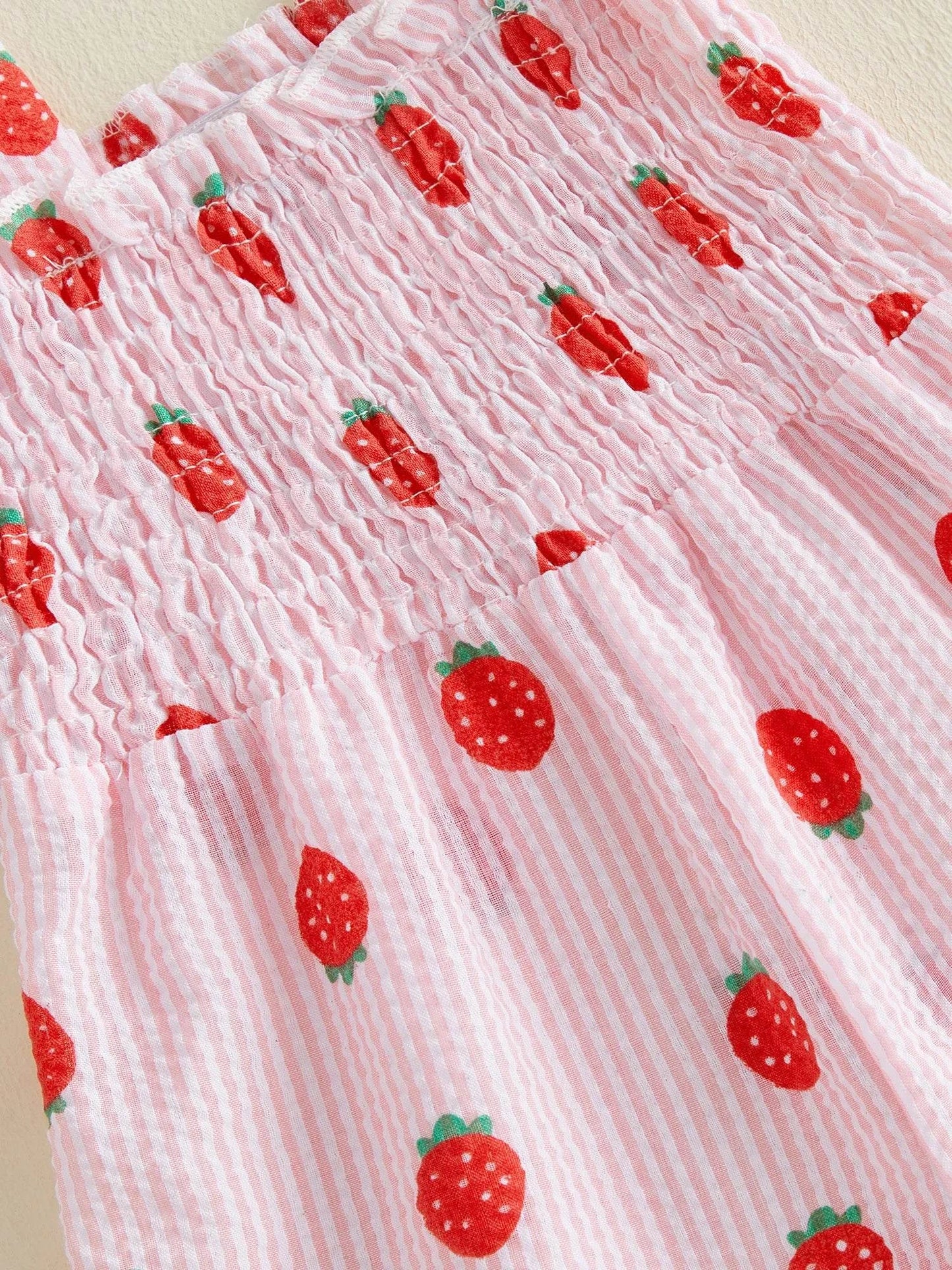 Cute strawberry onesie for girls designed for summer comfort and breathability