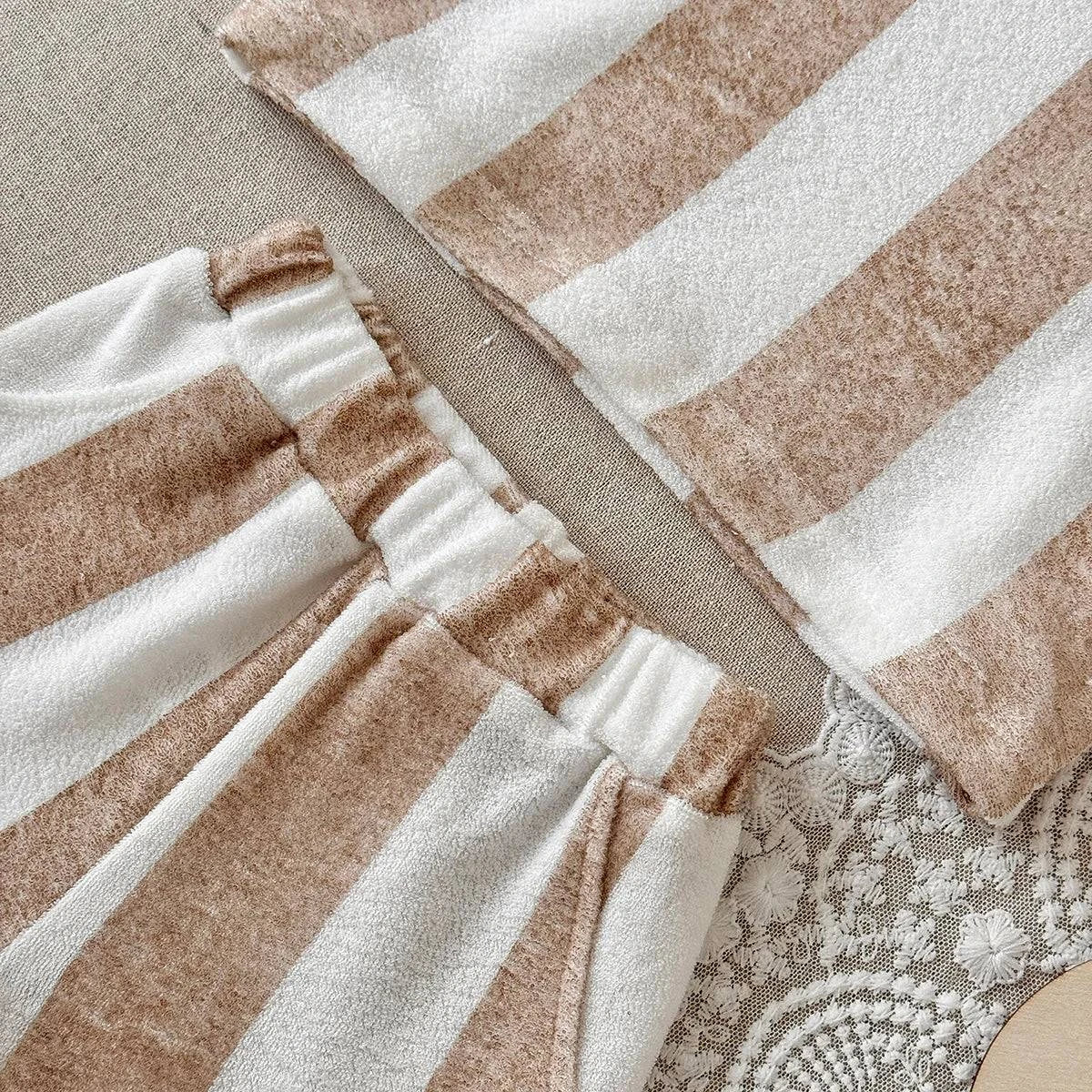 Child wearing Roman Stripe Shorts Set in soft towelling fabric with classic stripes for summer comfort