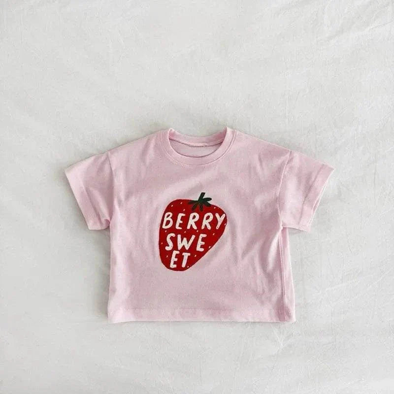 Child wearing Berry Sweet Tee with cute berry-picking design on soft cotton fabric