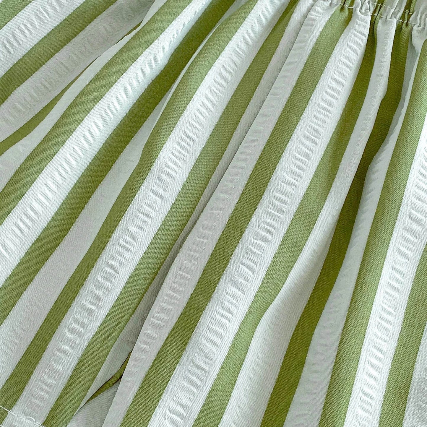 Kids wearing pinstripe casual shorts for summer outdoor play