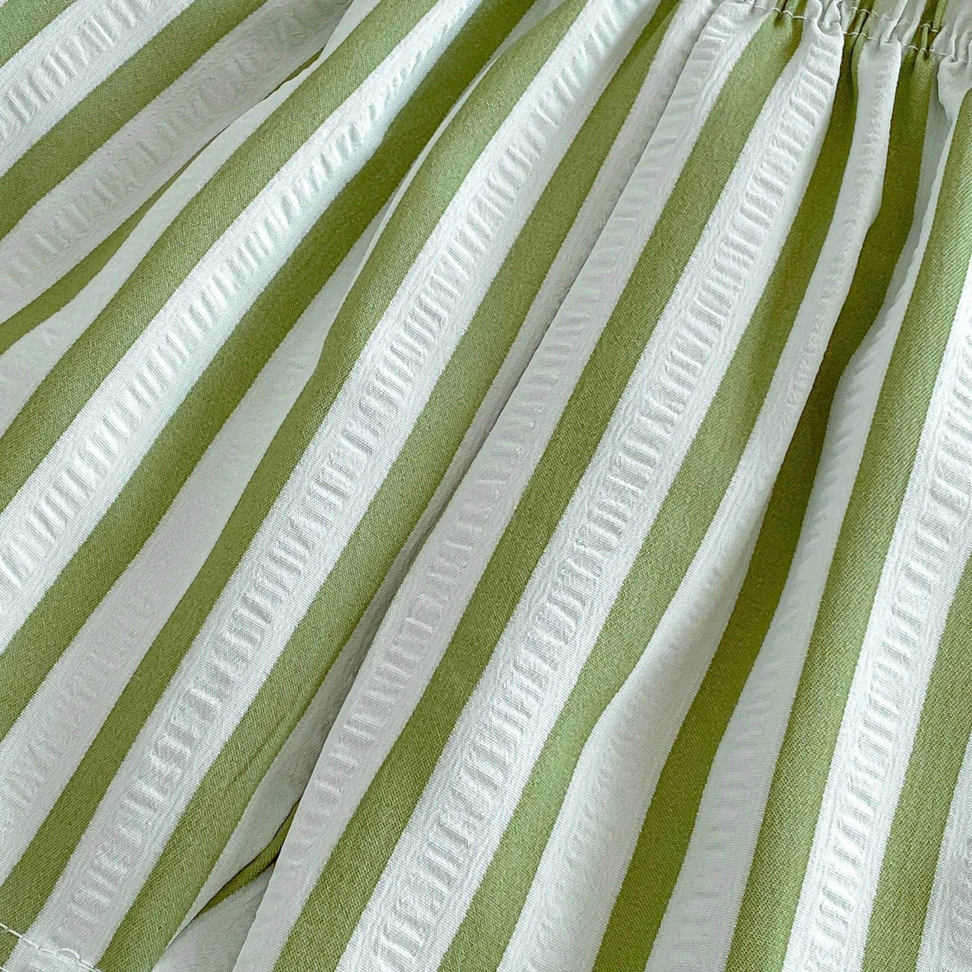 Kids wearing pinstripe casual shorts for summer outdoor play