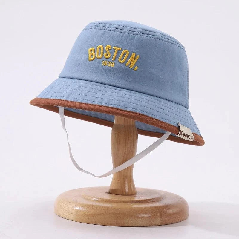 Boston Bucket Hat for toddlers with wide brim and soft fabric, perfect for sun protection and outdoor play