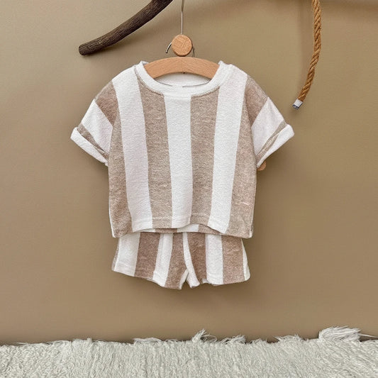 Child wearing Roman Stripe Shorts Set made of soft towelling fabric with classic stripes for summer comfort