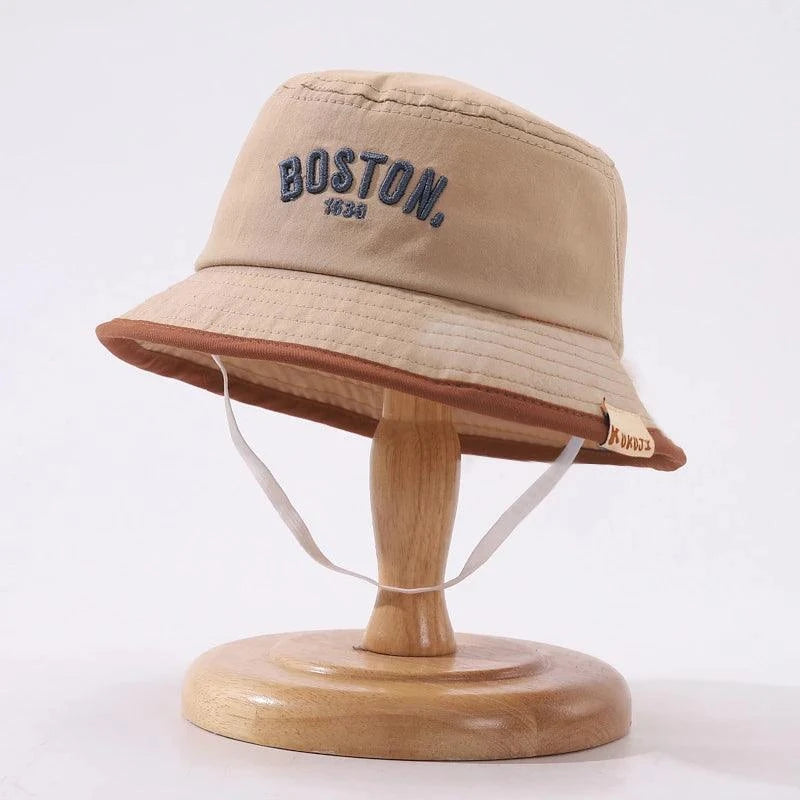 Toddler wearing Boston Bucket Hat outdoors for sun protection and style