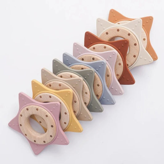 Star-shaped wooden baby teether for soothing gums and developing motor skills