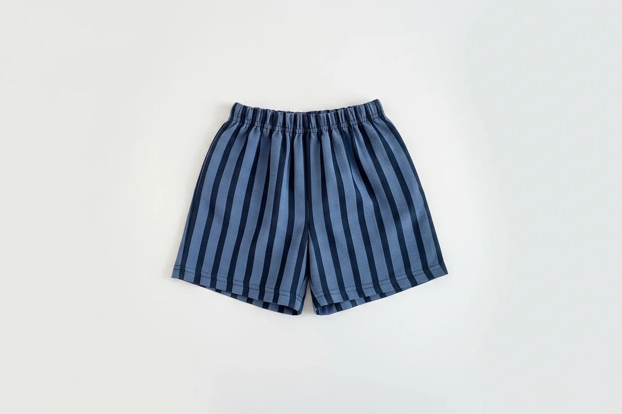 Kids wearing pinstripe casual shorts for summer adventures