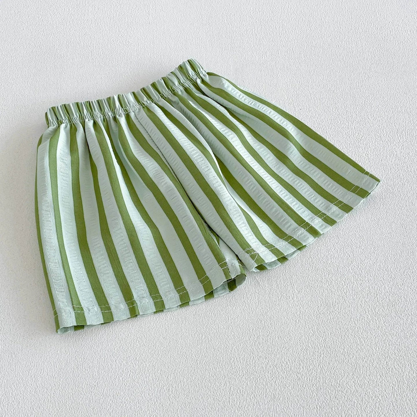 Kids wearing pinstripe casual shorts for summer adventures and playtime